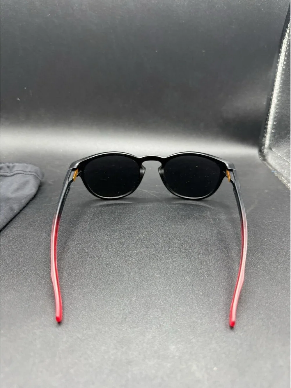 Oakley Latch Ruby Fade/Prizm Black Iridium Polarized Lens OO9265-2653